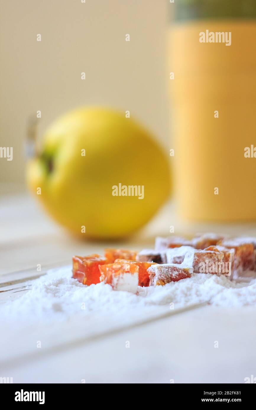 Quince jelly on sugar powder over the table Stock Photo Alamy
