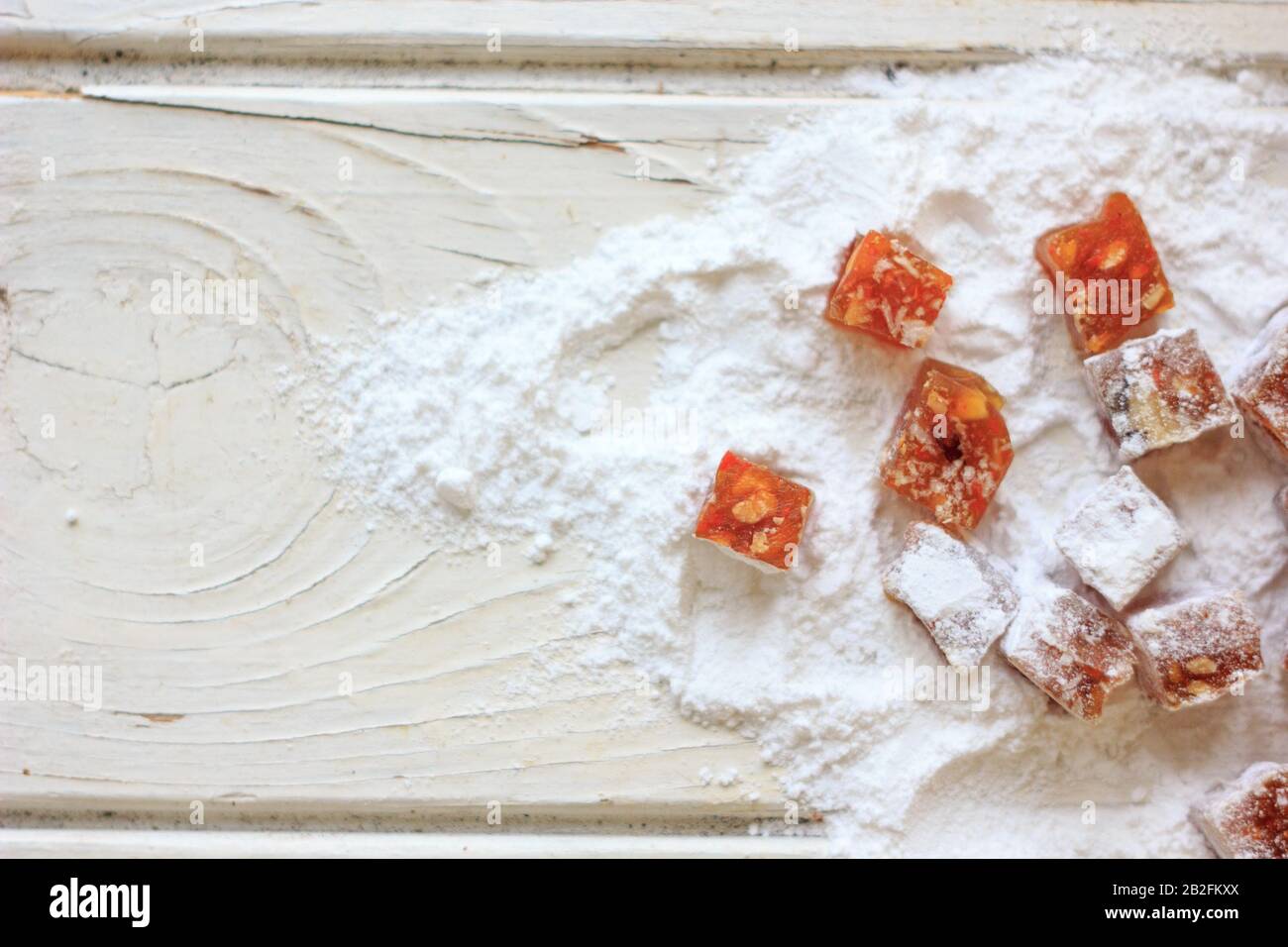 Pieces of quince jam in sugar powder Stock Photo Alamy