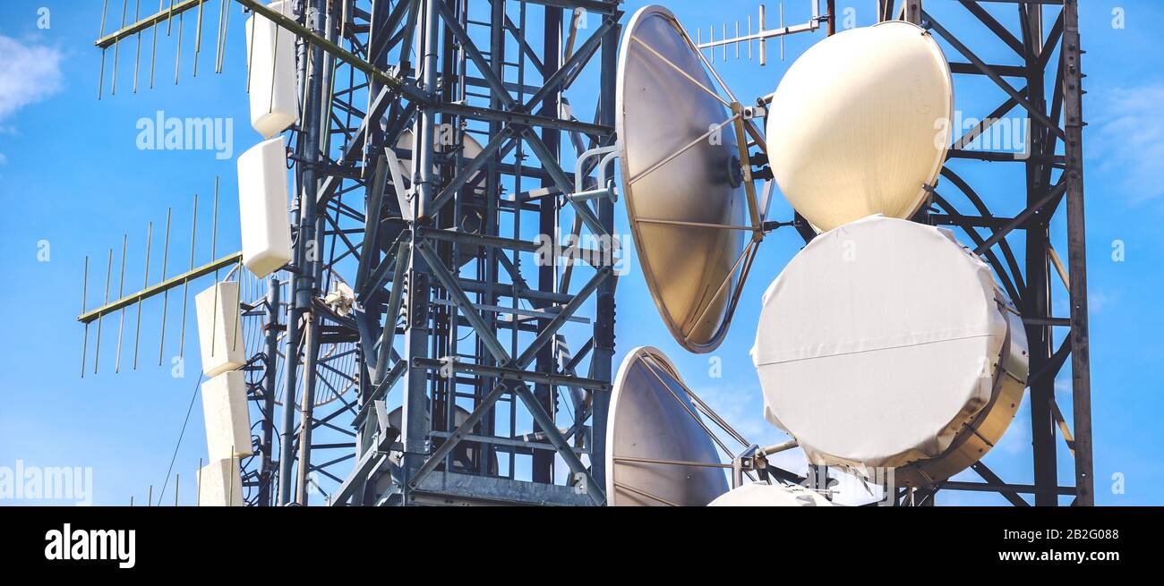 horizontal antenna background mass media tower pylons Stock Photo
