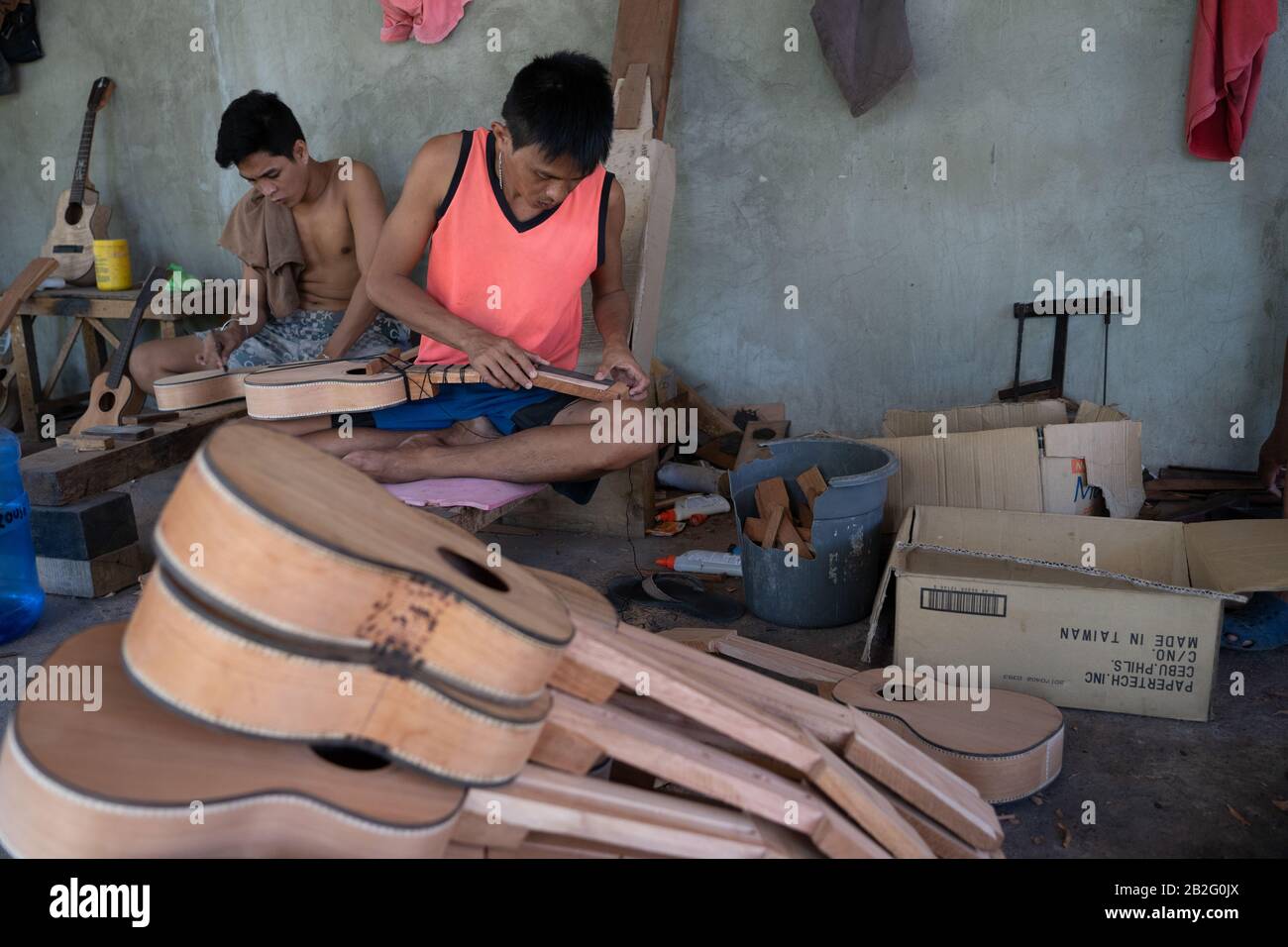 A handmade guitar being made at a guitar factory in Lapu lapu,Mactan