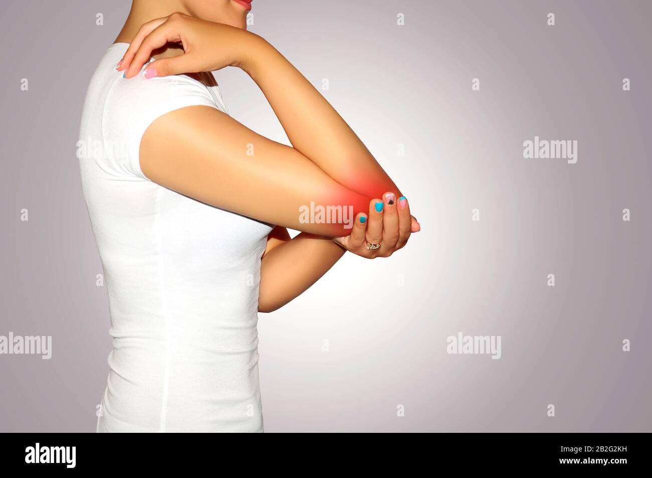 Cropped image woman with joint inflammation. Woman suffering from chronic joint rheumatism. Female's elbow. Elbow pain and treatment concept. Stock Photo