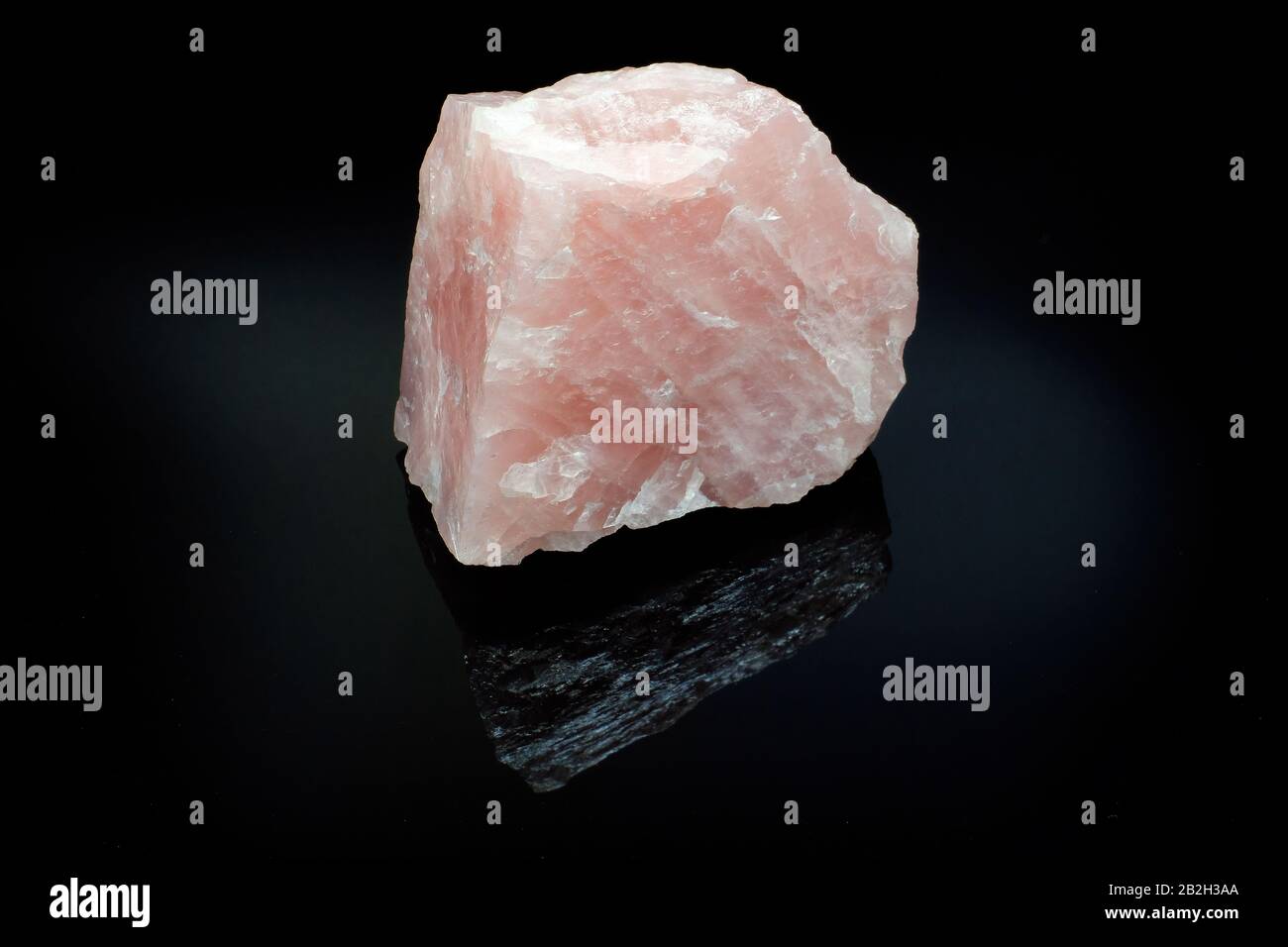 Rose quartz on black background Stock Photo