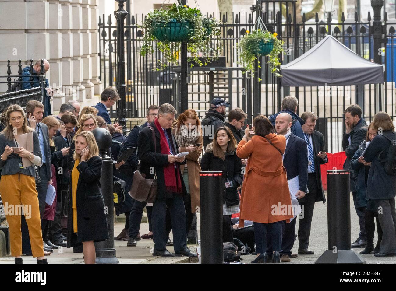London, UK. 3rd Mar, 2020. Journalist wait in Downing Street, London before a press conference on the coronavirus Credit: Ian Davidson/Alamy Live News Stock Photo