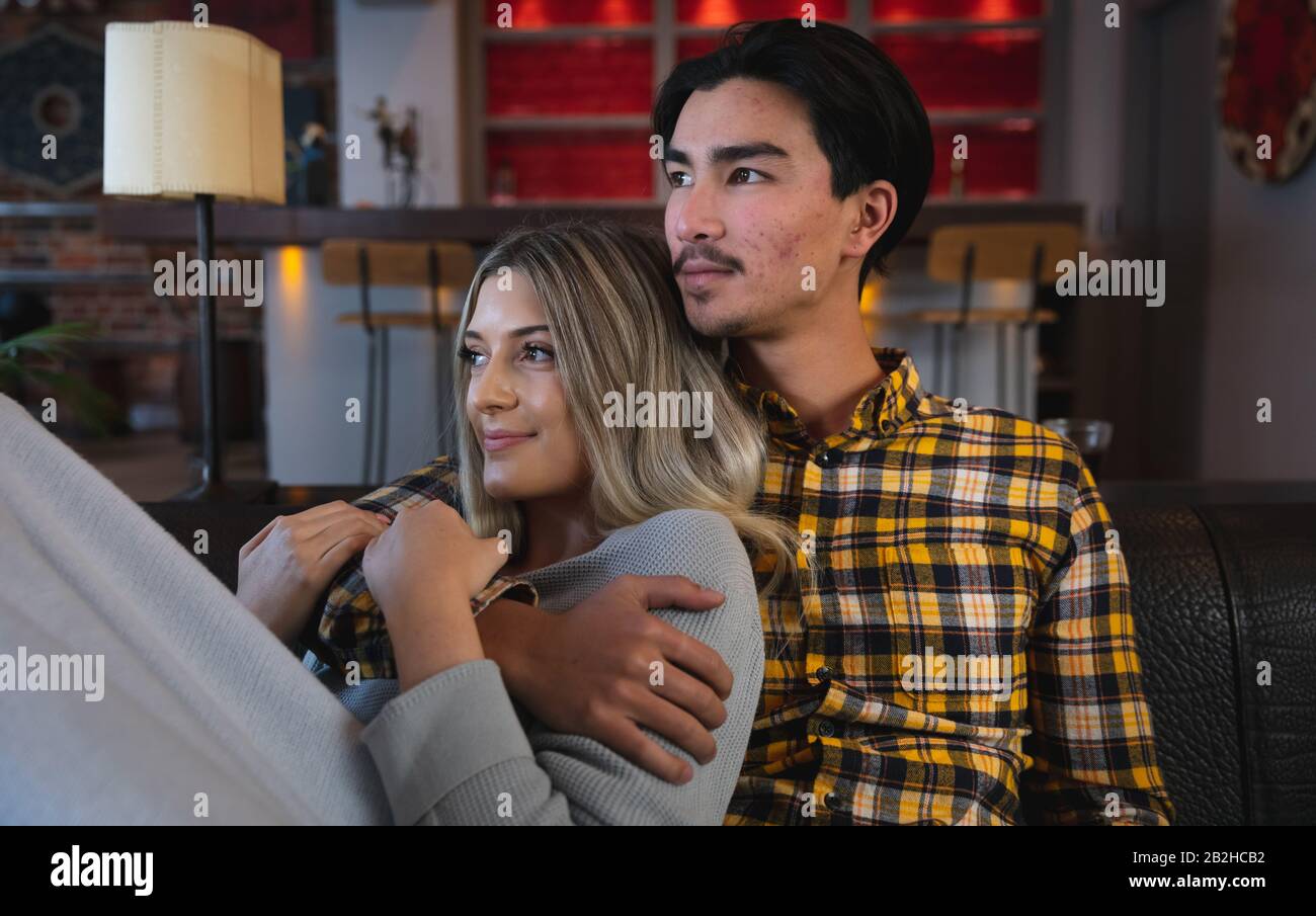 Interracial couple hugging hi-res stock photography and images - Alamy