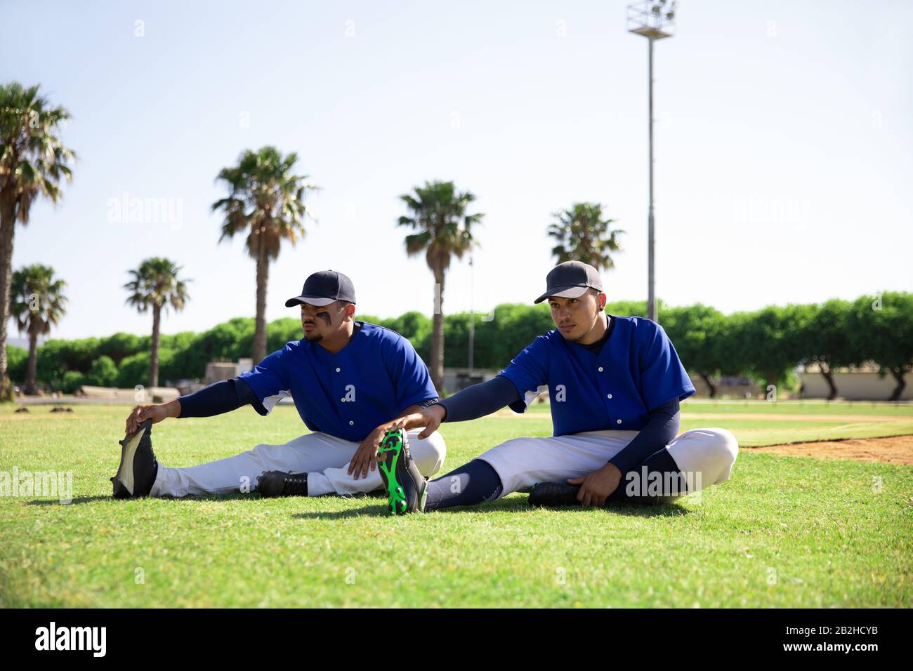 Baseball players stretching Stock Photo