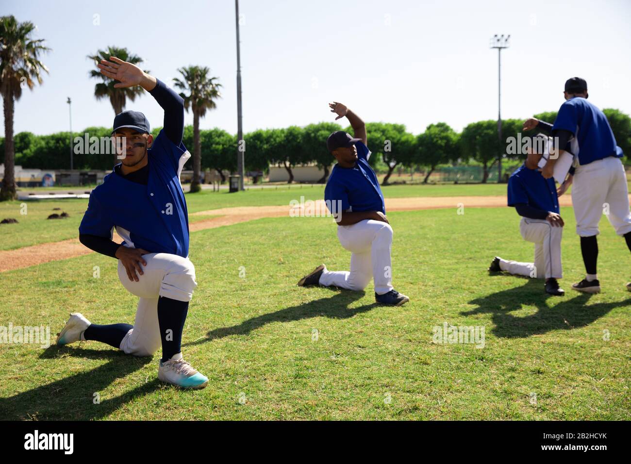 Baseball players stretching Stock Photo