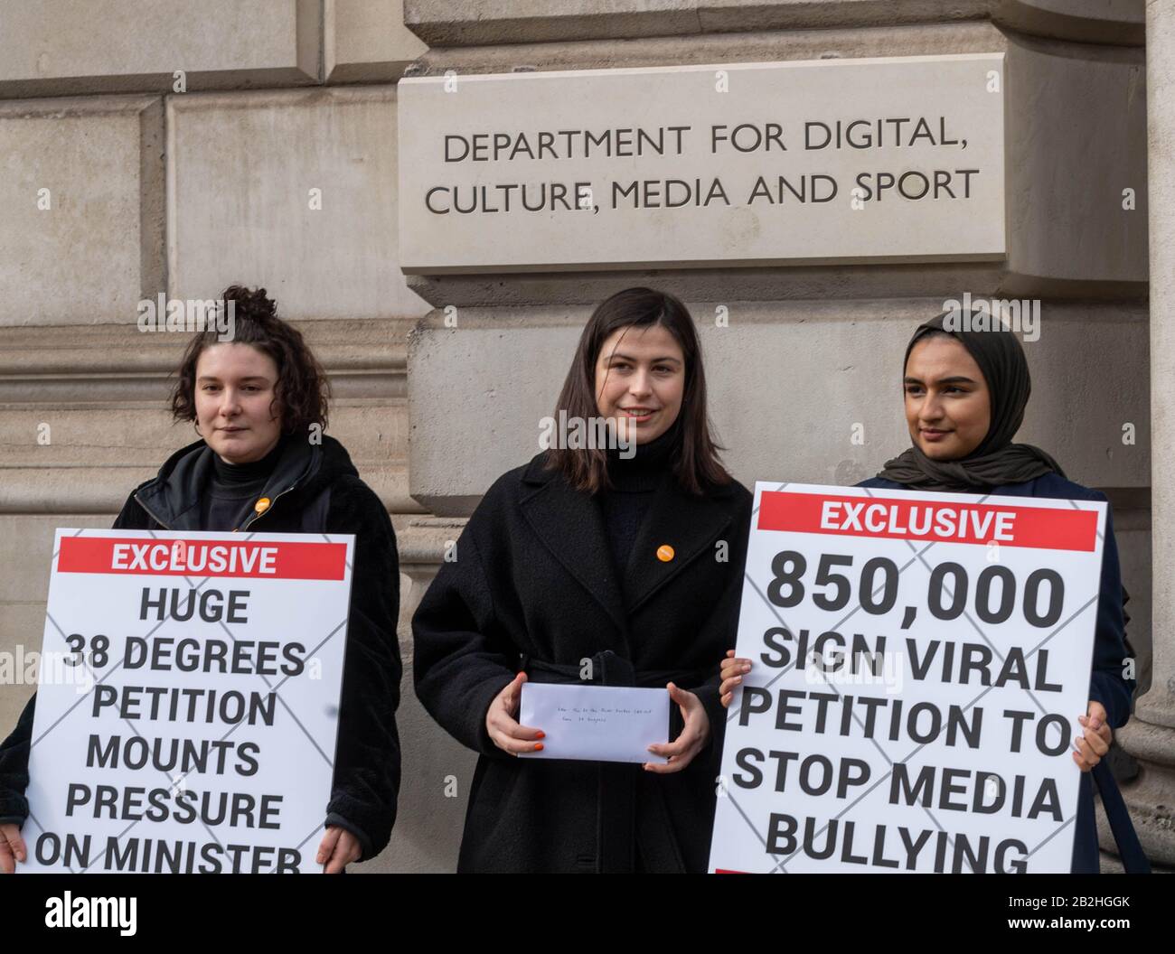 London, UK. 3rd Mar, 2020. Campaigning group 38 degrees hand in a 850,000 name petition to the Department of Culture Media and Suport against alleged media bullying. The petition calls on MPs to “end the harassment and bullying by the British press” after Caroline Flack's death Three lorries carrying placards supporting the petition circled Parliament Square Credit: Ian Davidson/Alamy Live News Stock Photo