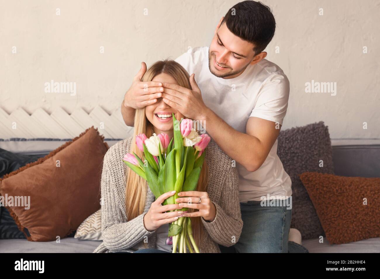 surprising girlfriend with flowers