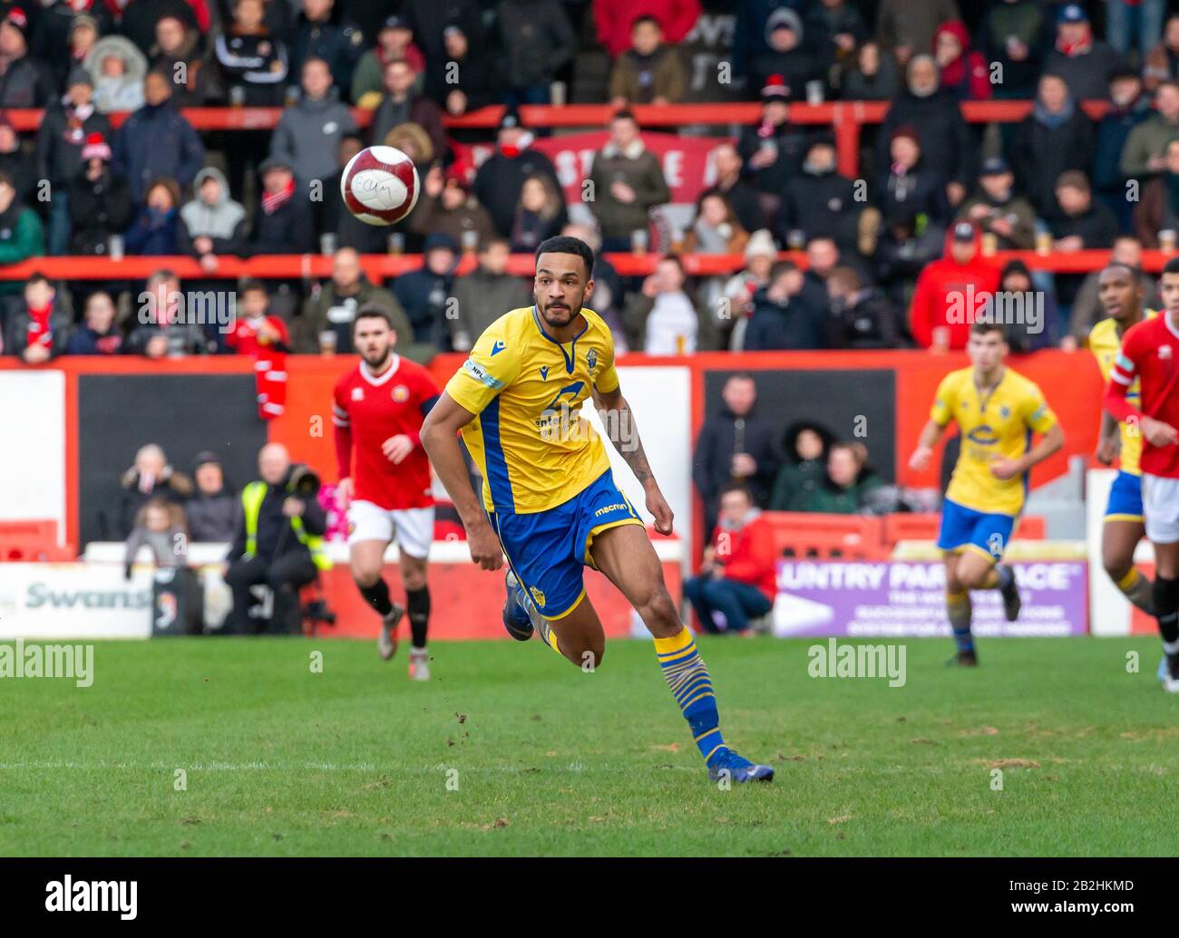 Warrington's Jordan Buckley chases the ball whilst attacking the FCUM goal Stock Photo