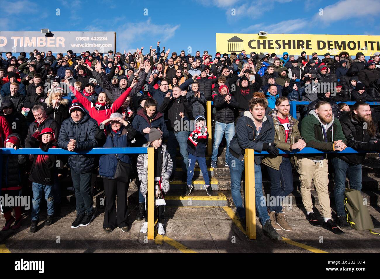 Salford City FC fans. Moss Road Stadium. Macclesfield Town. Stock Photo