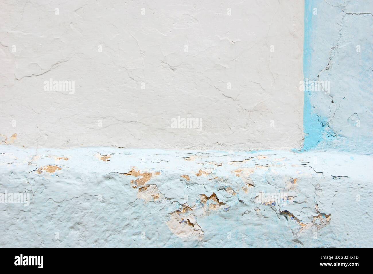 Abstract white and light blue detail adobe wall painted in Albarracin Stock Photo