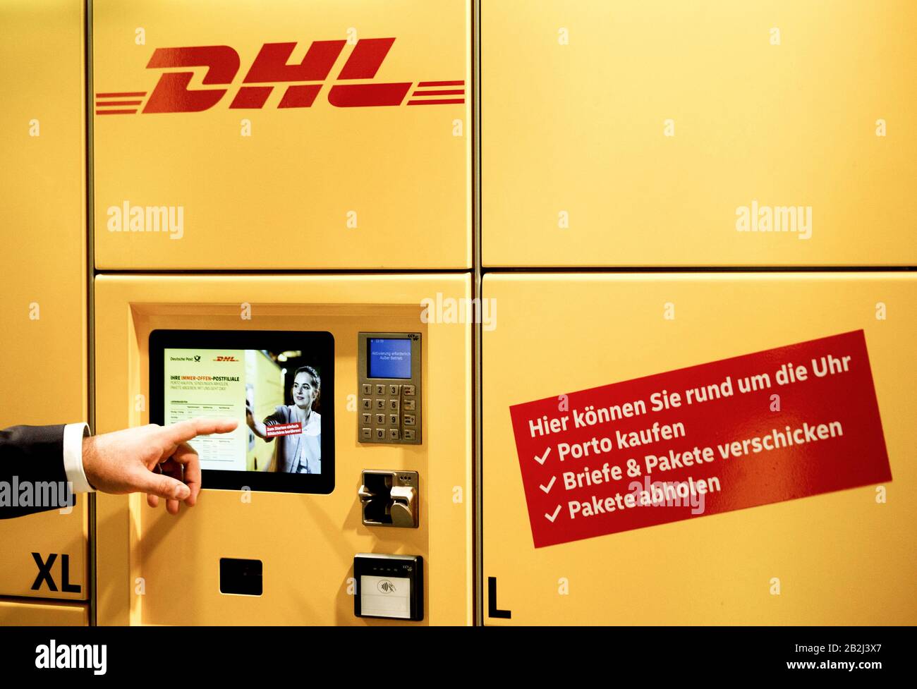 Berlin, Germany. 03rd Mar, 2020. At a press conference of DHL Post & Paket  Deutschland, a product manager presents a DHL Packstation. In a press  conference, the company presented its plans for