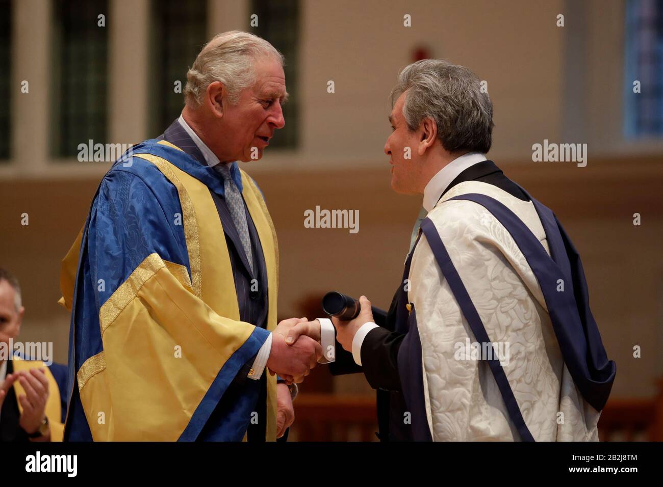 The Prince of Wales Charles presents English-Italian conductor and pianist Sir Antonio Pappano with an honorary Doctor of Music award at the Royal College of Music's annual awards in London. Stock Photo