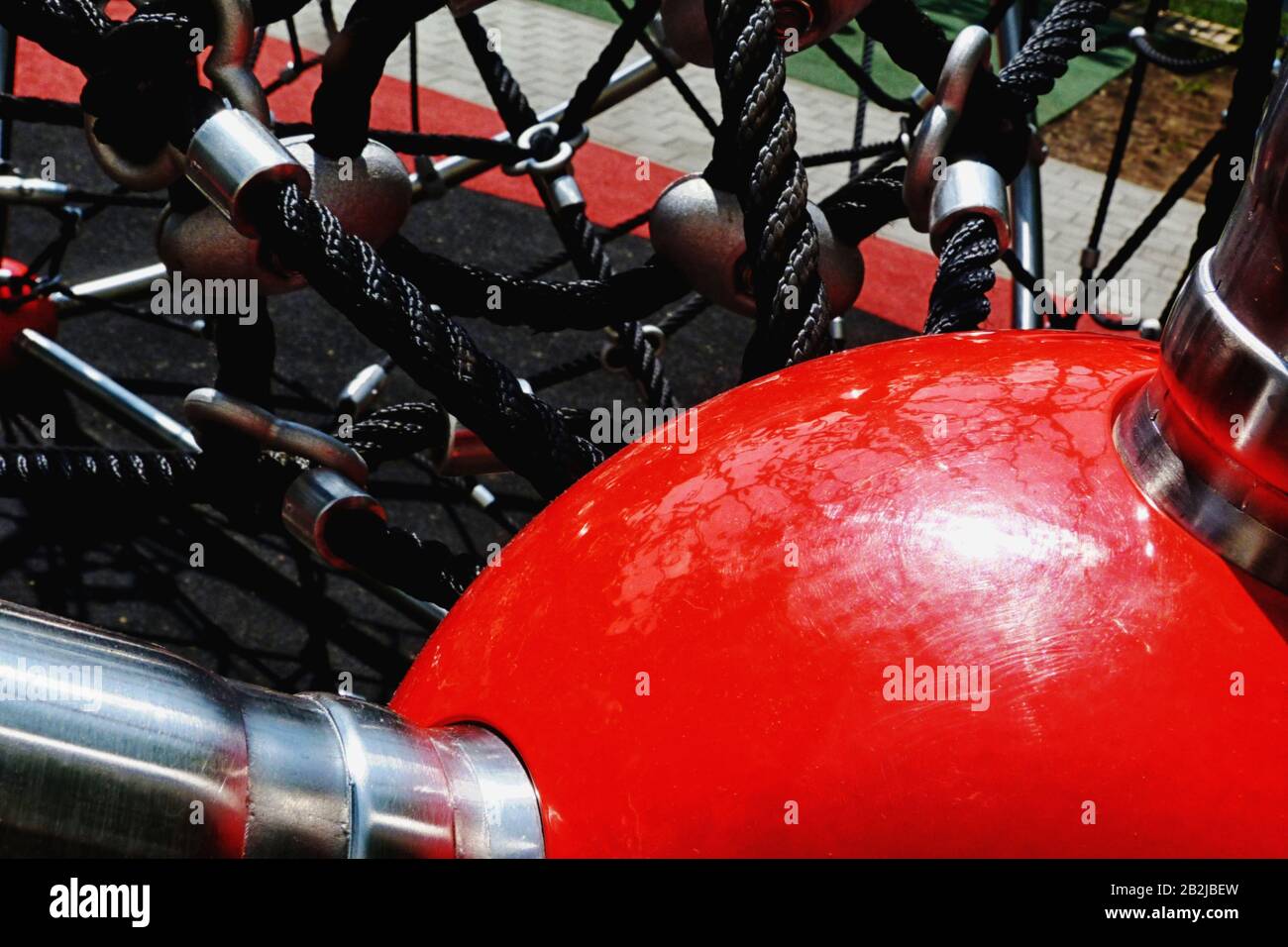 kids climbing equipment in playground and public park setting with