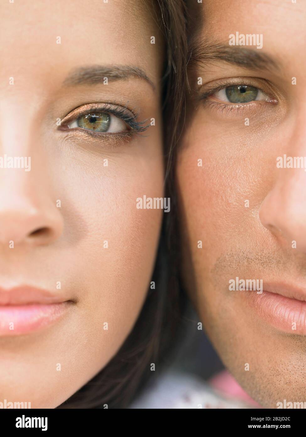 Young Couple Cheek to Cheek Stock Photo - Alamy