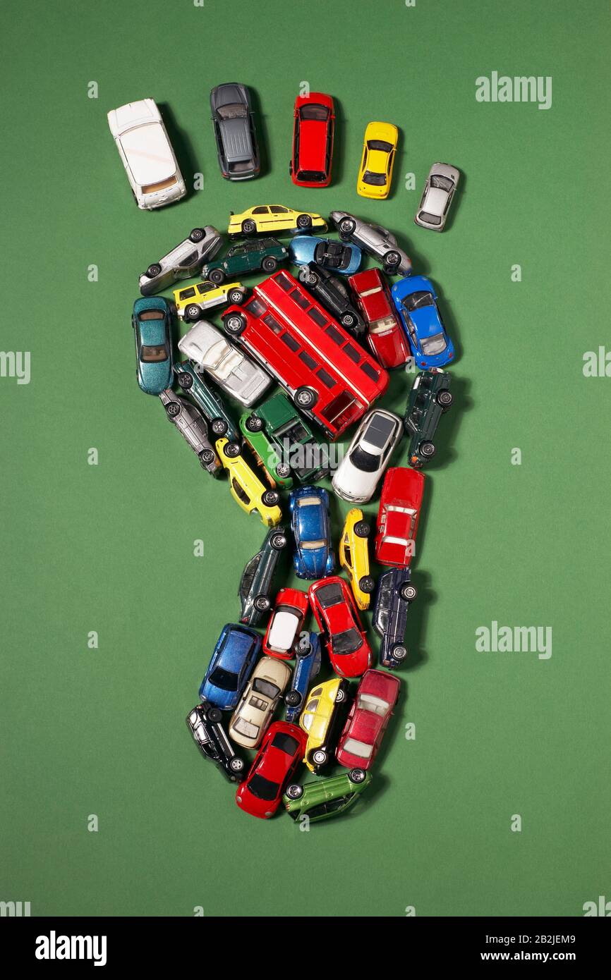 Footprint shape made of toy cars Stock Photo