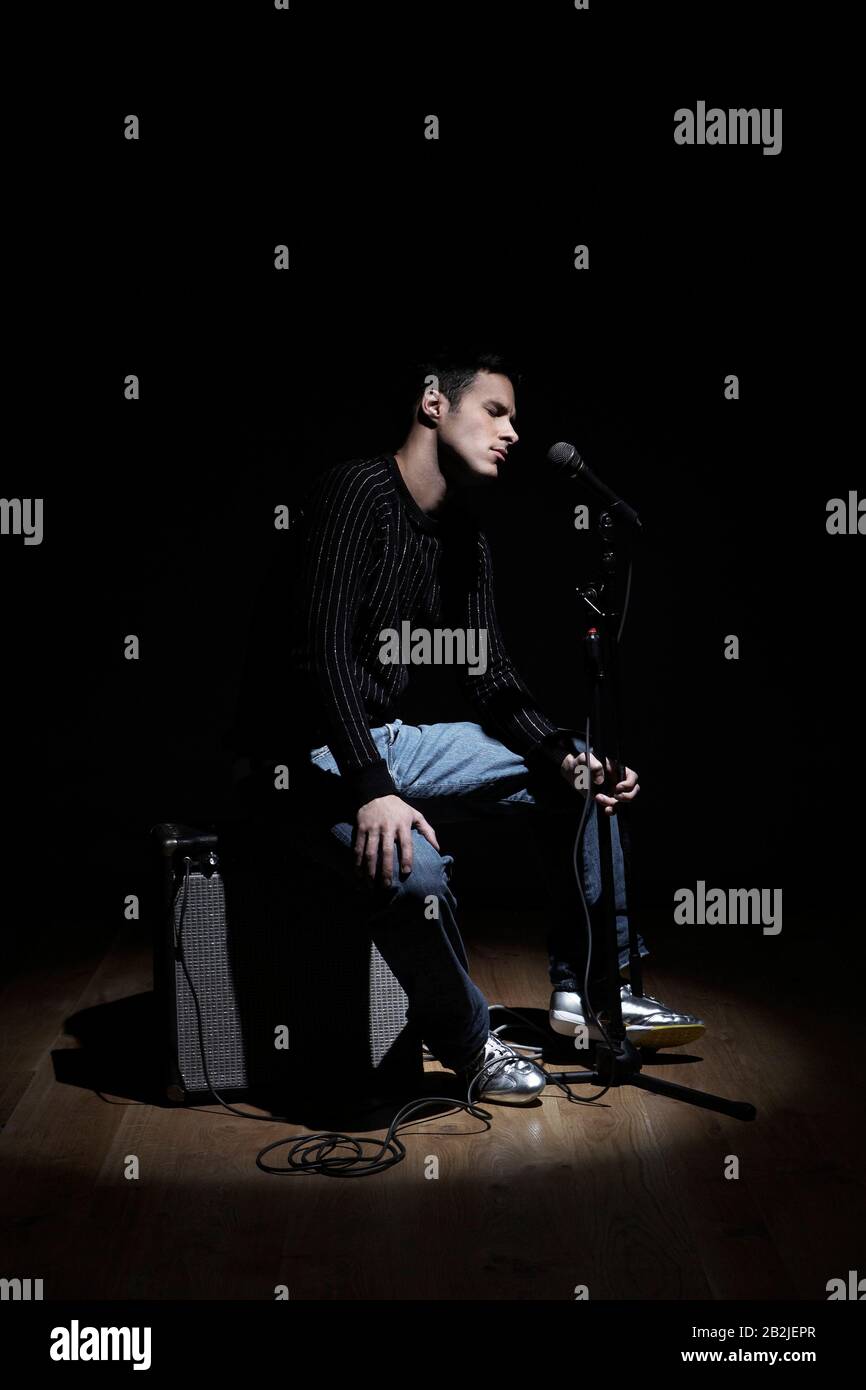 Singing microphone denim hi-res stock photography and images - Alamy