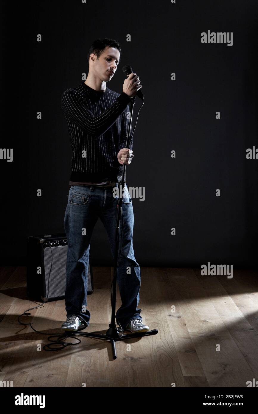 Microphone denim jeans hi-res stock photography and images - Alamy