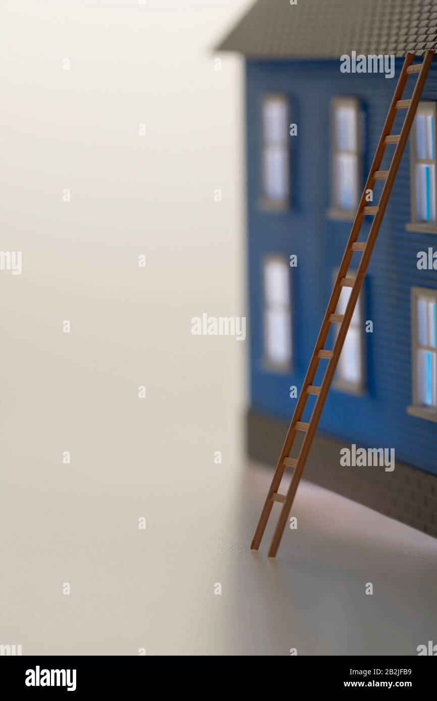 Model house with ladder Stock Photo - Alamy