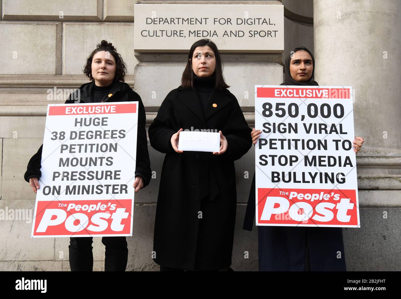 (left to right) Campaigns Intern at 38 Degrees Ella Aedh, Campaigns Manager Holly Maltby and Campaigns Assistant Sana Yusuf, hand in the Caroline's Law petition at the Department for Digital Culture, Media and Sport, London, which is calling for an end to harassment and bullying by the British press. Stock Photo