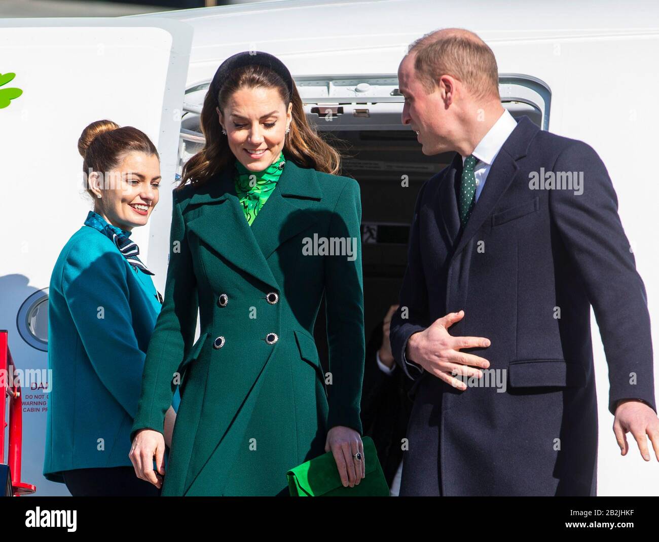 The Duke and Duchess of Cambridge walk down the steps of the plane as they arrive at Dublin International Airport ahead of their three day visit to the Republic of Ireland. Stock Photo
