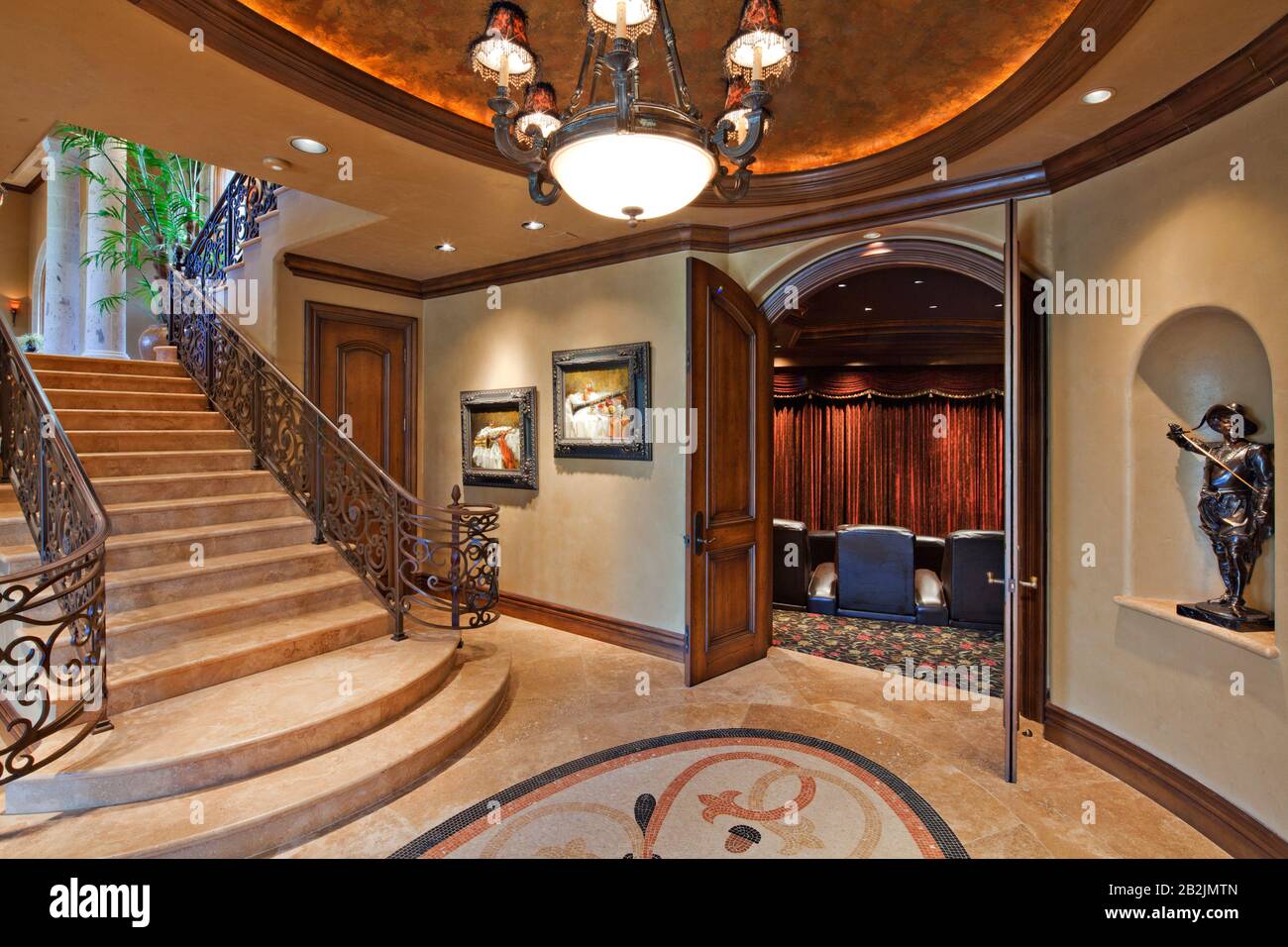 Hallway with stairway and open door in luxury mansion Stock Photo Alamy