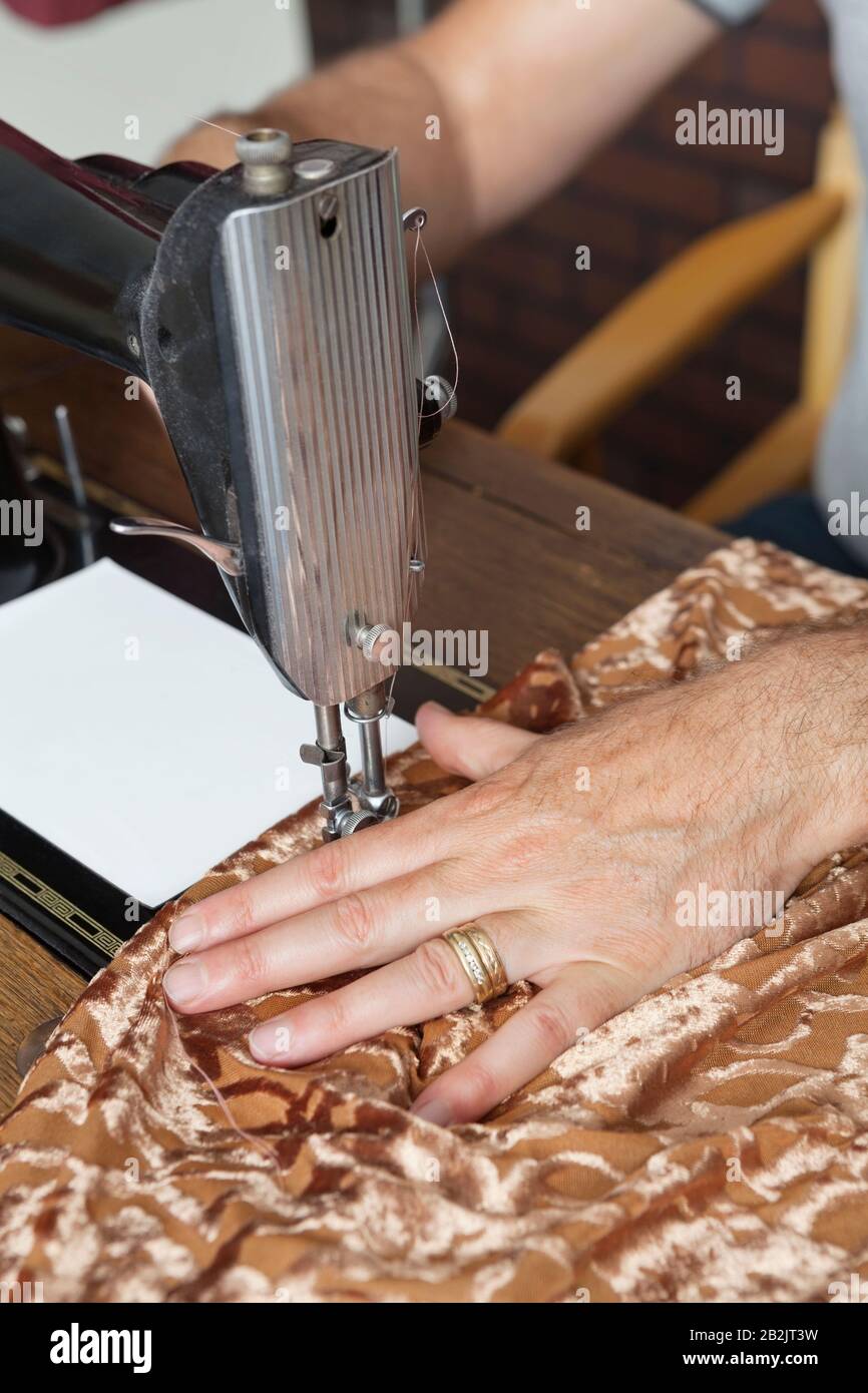 Mature male dressmaker stitching cloth hi-res stock photography and images  - Alamy