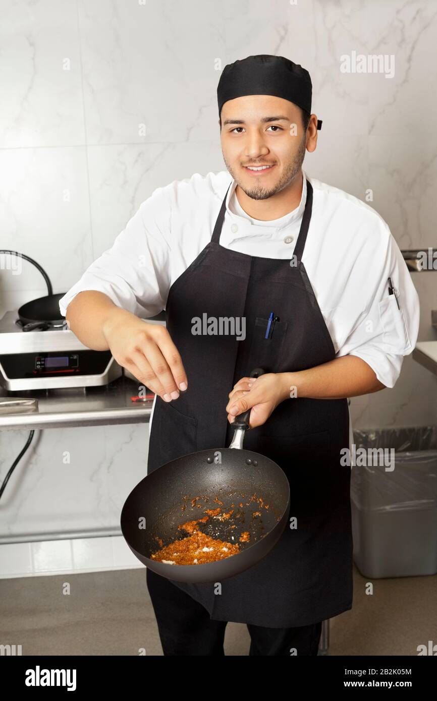 Portrait young latin chef hi-res stock photography and images - Alamy