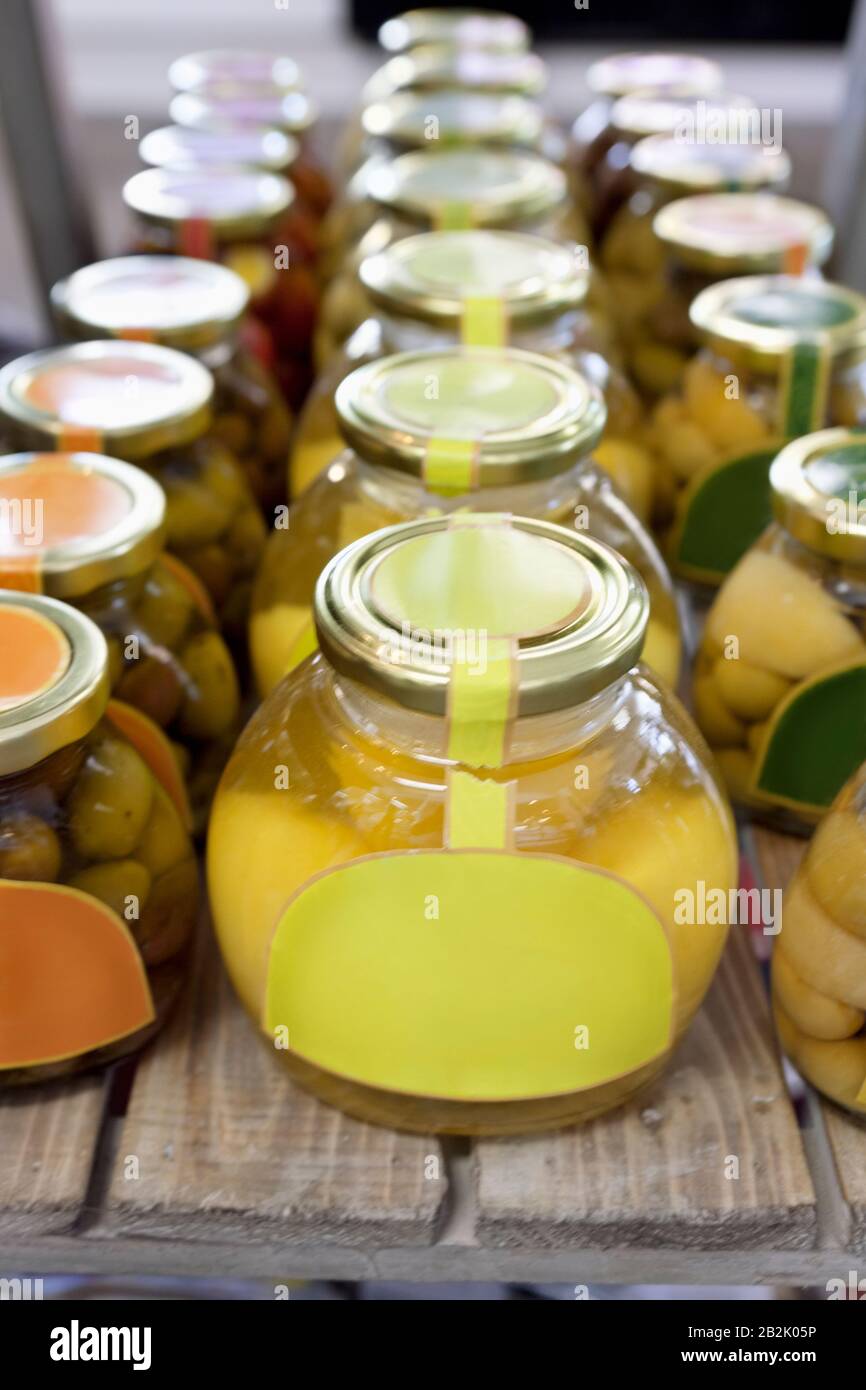 Olive oil and clarified butter preserved in jars Stock Photo