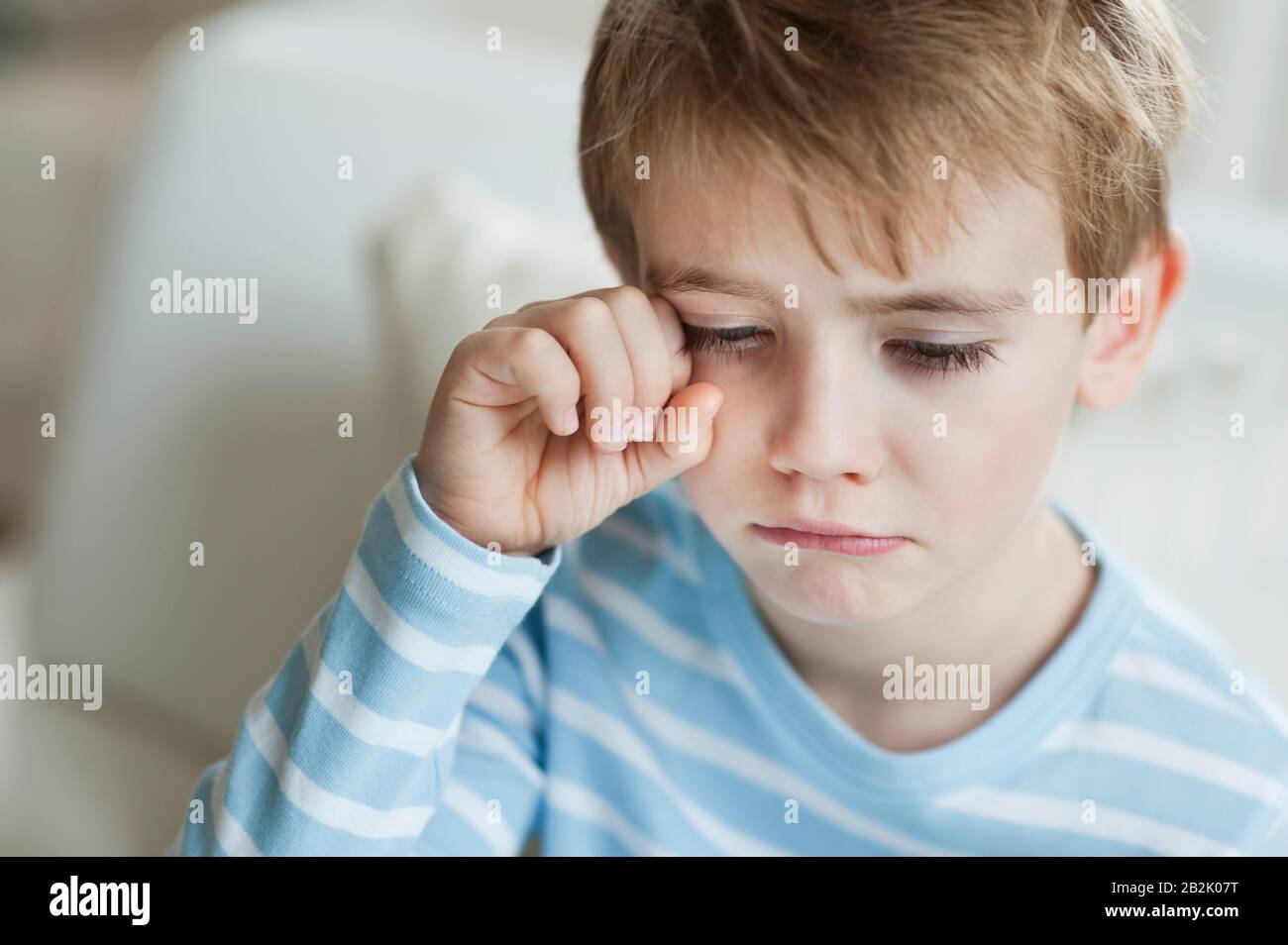 Close-up of a cute little boy crying Stock Photo - Alamy