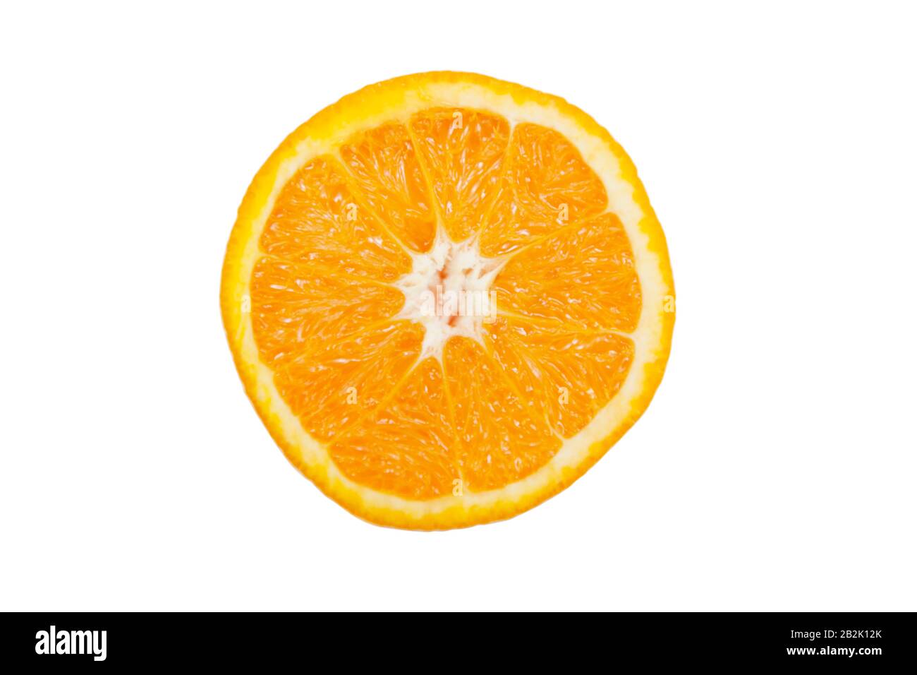 Cross section of sliced pulpy orange against white background Stock Photo