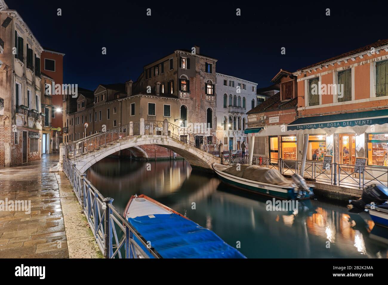 Night view of the romantic Venice with restaurants , bridges and canals Stock Photo