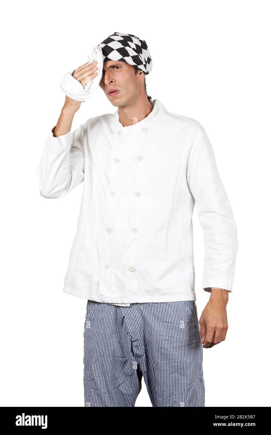 Chef mopping his brow in studio Stock Photo Alamy