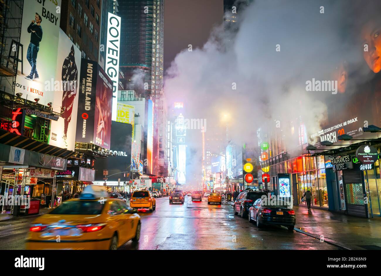 Times square reflection dusk wet rain new york hi-res stock