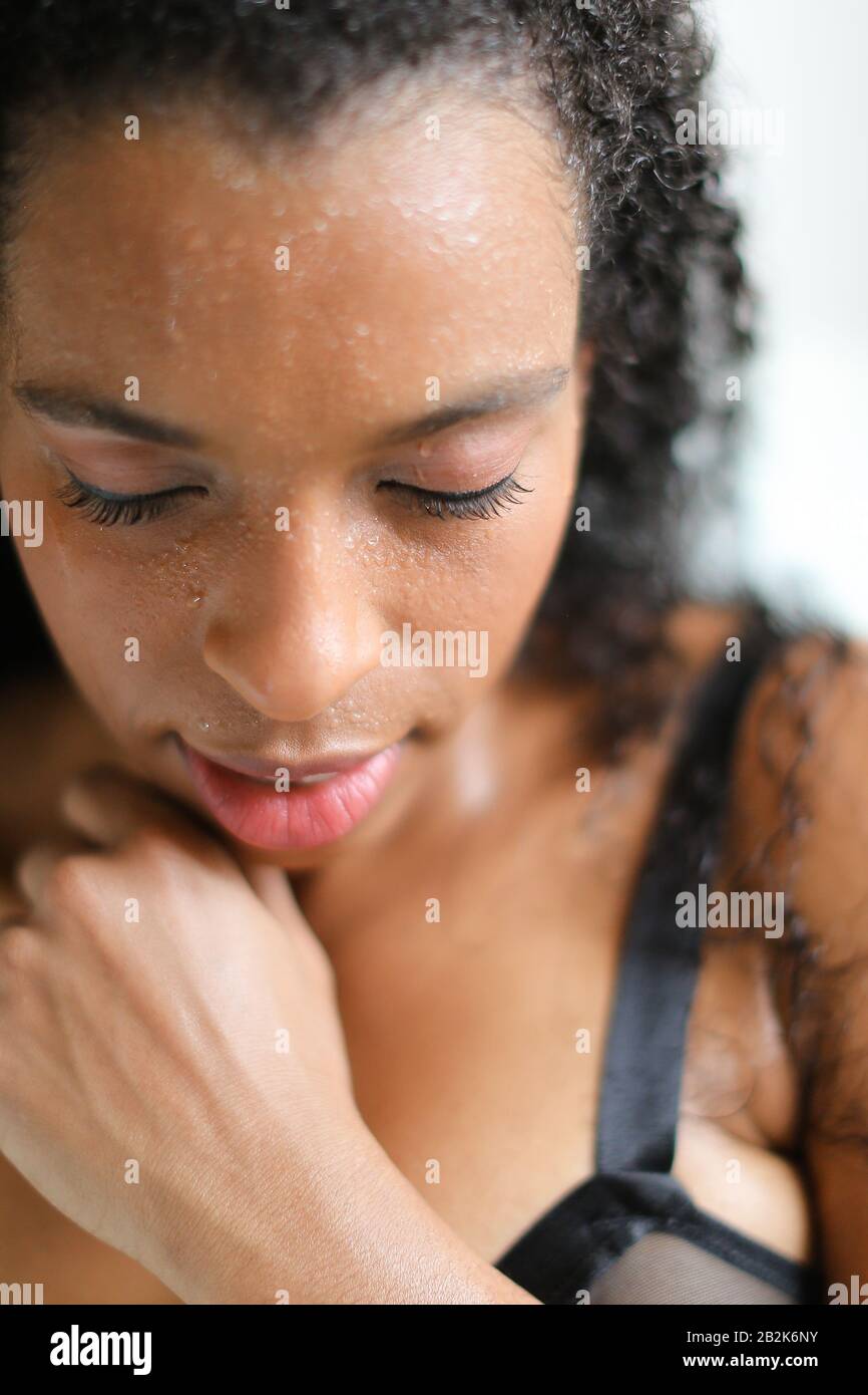 Closeup portrait of black girl wearing bra with no makeup Stock Photo -  Alamy