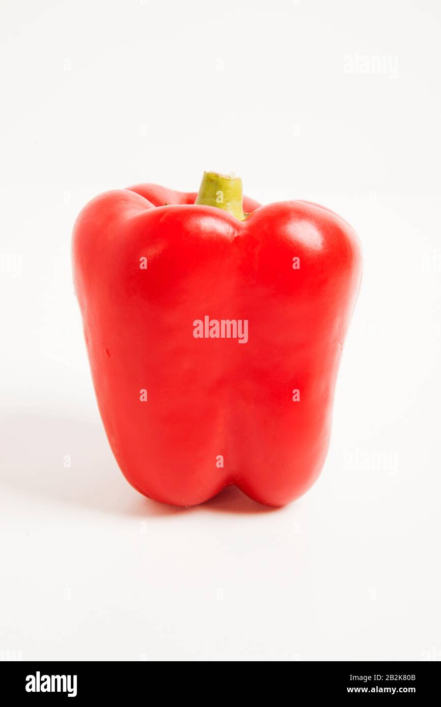 Close-up of red bell pepper over white background Stock Photo