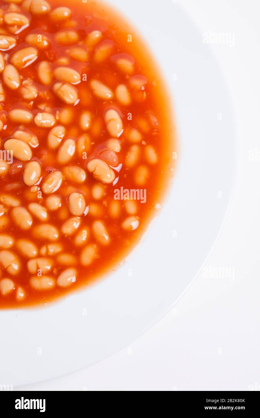 Cropped shot of plate full of beans Stock Photo