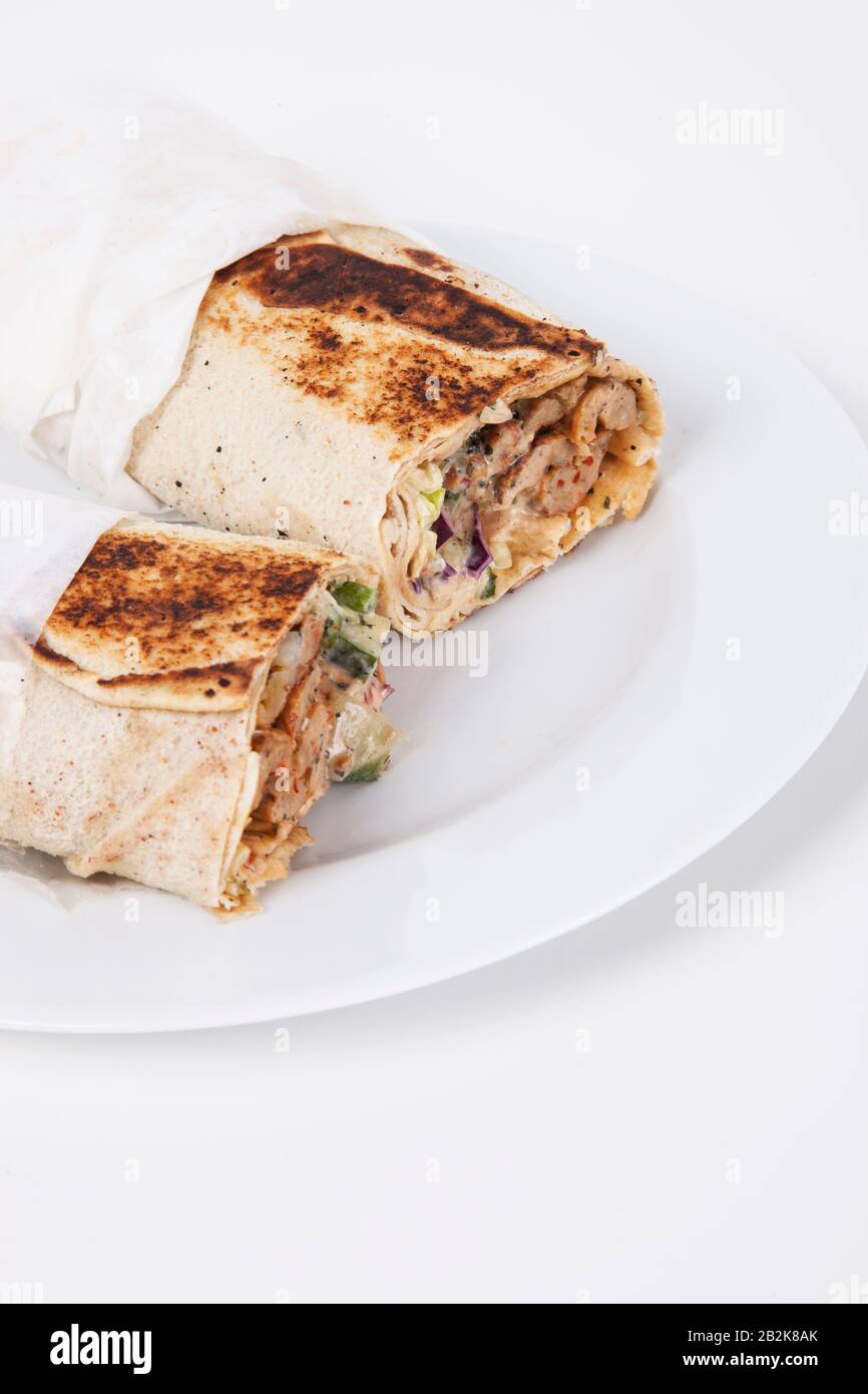 Wraps in plate over white background Stock Photo