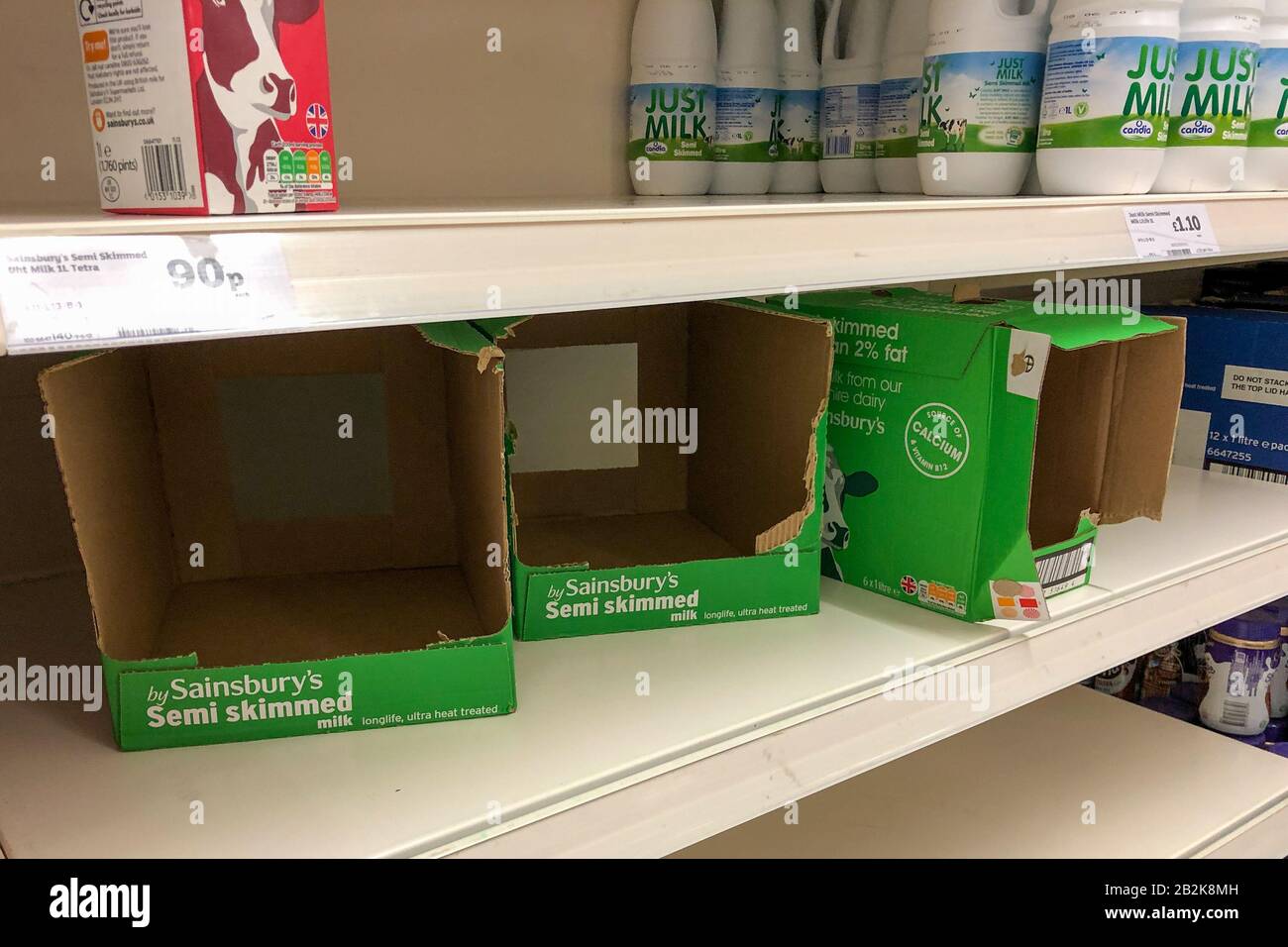 Milk on shelves supermarket in hi res stock photography and images