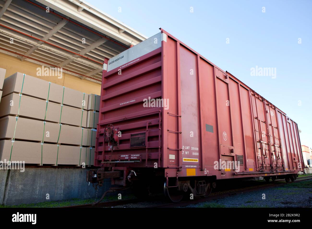 Industrial railway carriage transporting Lumber by rail Stock Photo Alamy