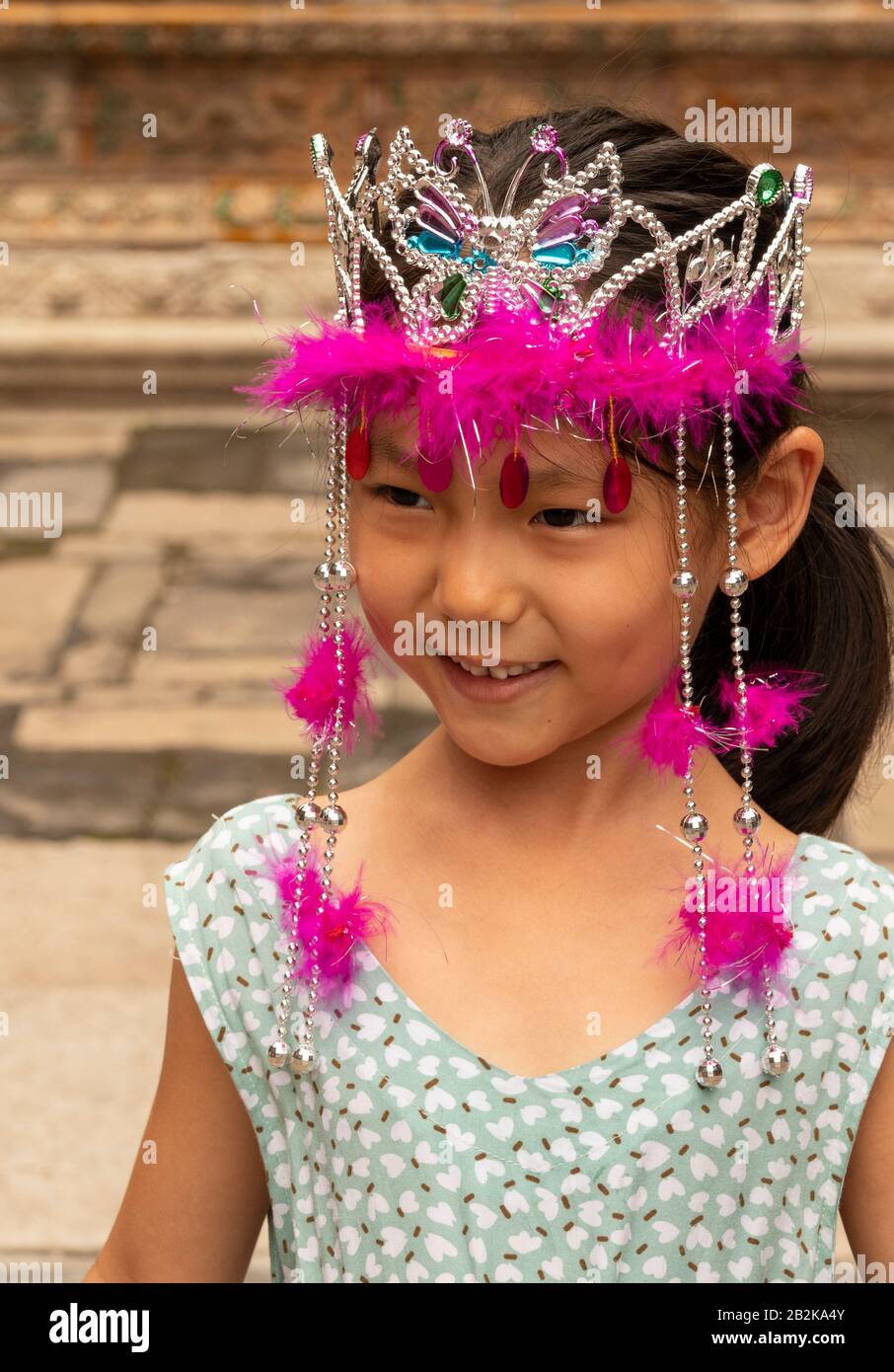young Chinese girl dressed up, Beijing, China Stock Photo