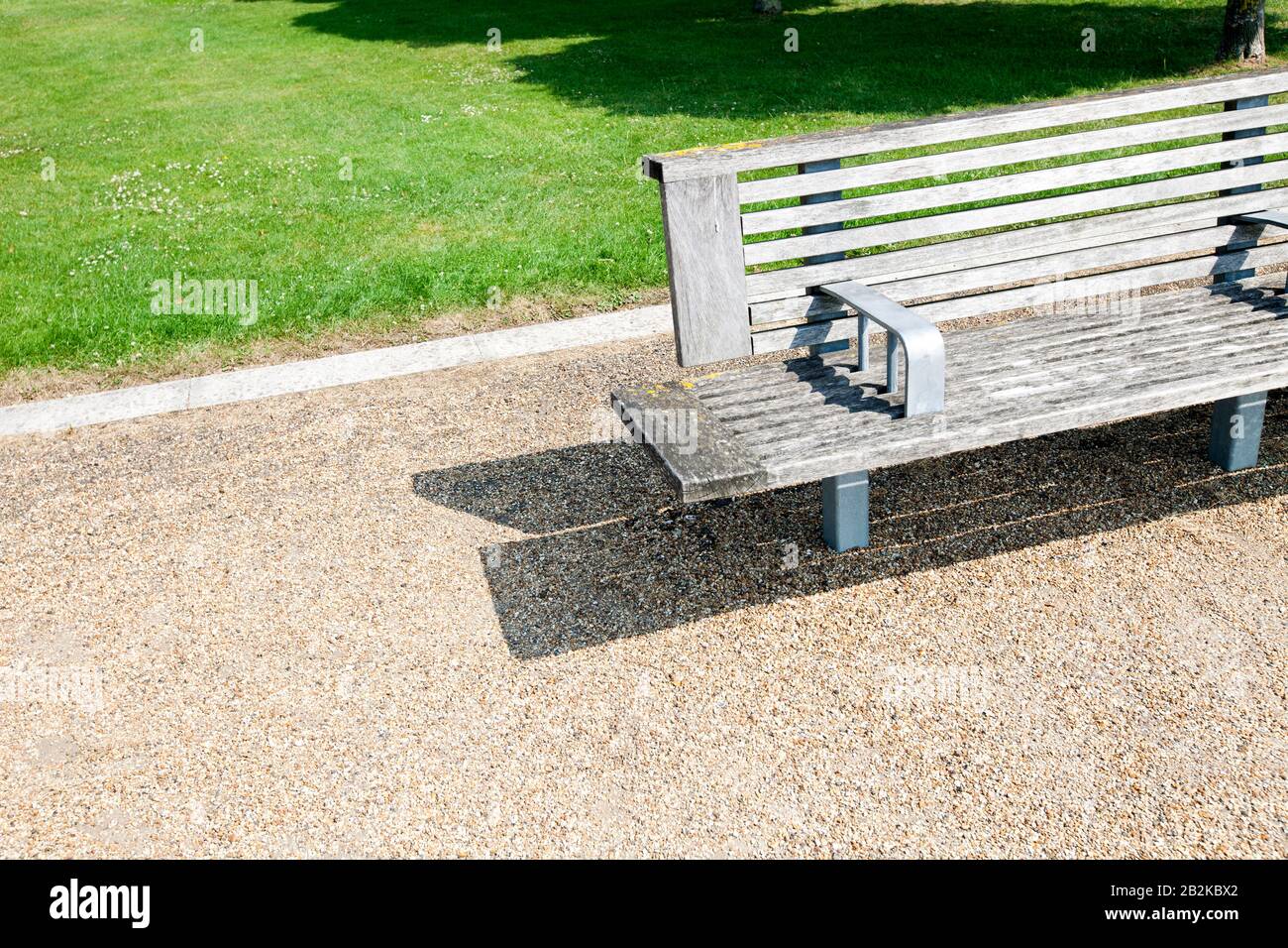 Close-up view of Wooden bench in London Park Stock Photo