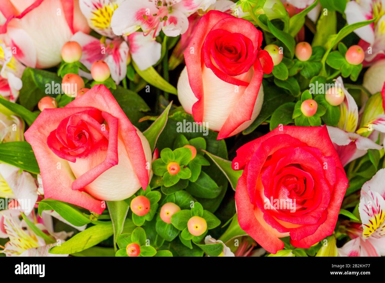 Beautiful Flower Arrangement Made By 3 Big Roses Stock Photo - Alamy