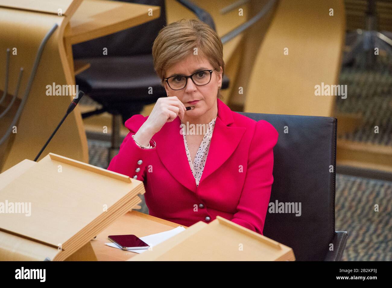Edinburgh, UK. 3rd Mar, 2020. Pictured: Nicola Sturgeon MSP - First Minister of Scotland and Leader of the Scottish National Party (SNP). Ministerial Statement from Health Minister, Jeane Freeman MSP on the state of Coronovirus and Scotland's readiness to to mitigate the spread of the virus across Scotland. Scenes from the Scottish Parliament in Holyrood, Edinburgh. Credit: Colin Fisher/Alamy Live News Stock Photo