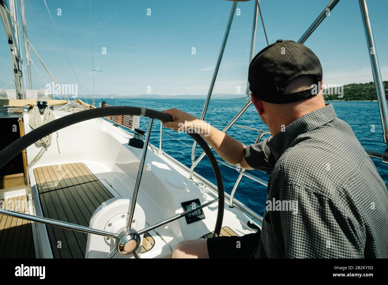 Male Skipper On The Steering Wheel Of A Yacht Sailing And Yachting Concept Stock Photo Alamy Male Skipper On The Steering Wheel Of A Yacht Sailing And Yachting Concept Stock Photo Alamy