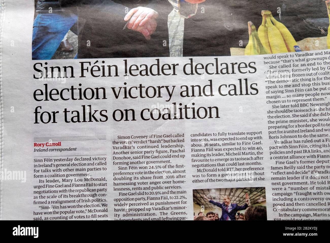 'Sinn Féin leader declares election victory and calls for talks on coalition' Guardian newspaper article headline inside page February 2020 London UK Stock Photo