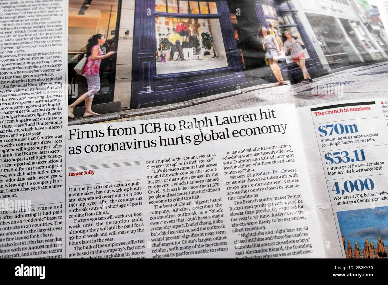 Firms from JCB to Ralph Lauren hit as coronavirus hurts global economy"  newspaper article headline in the Guardian in February 2020 London England  UK Stock Photo - Alamy