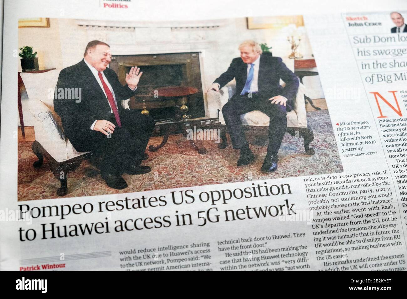 Mike 'Pompeo restates US opposition to Huawei access in 5G network'  with Boris Johnson Guardian newspaper article 31 January 2020 London England UK Stock Photo