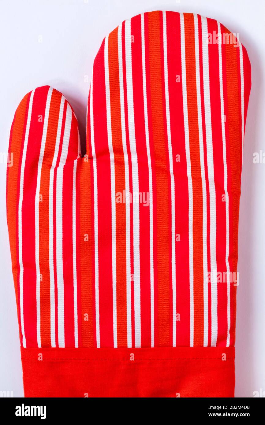 red and white striped oven mitts on white background Stock Photo