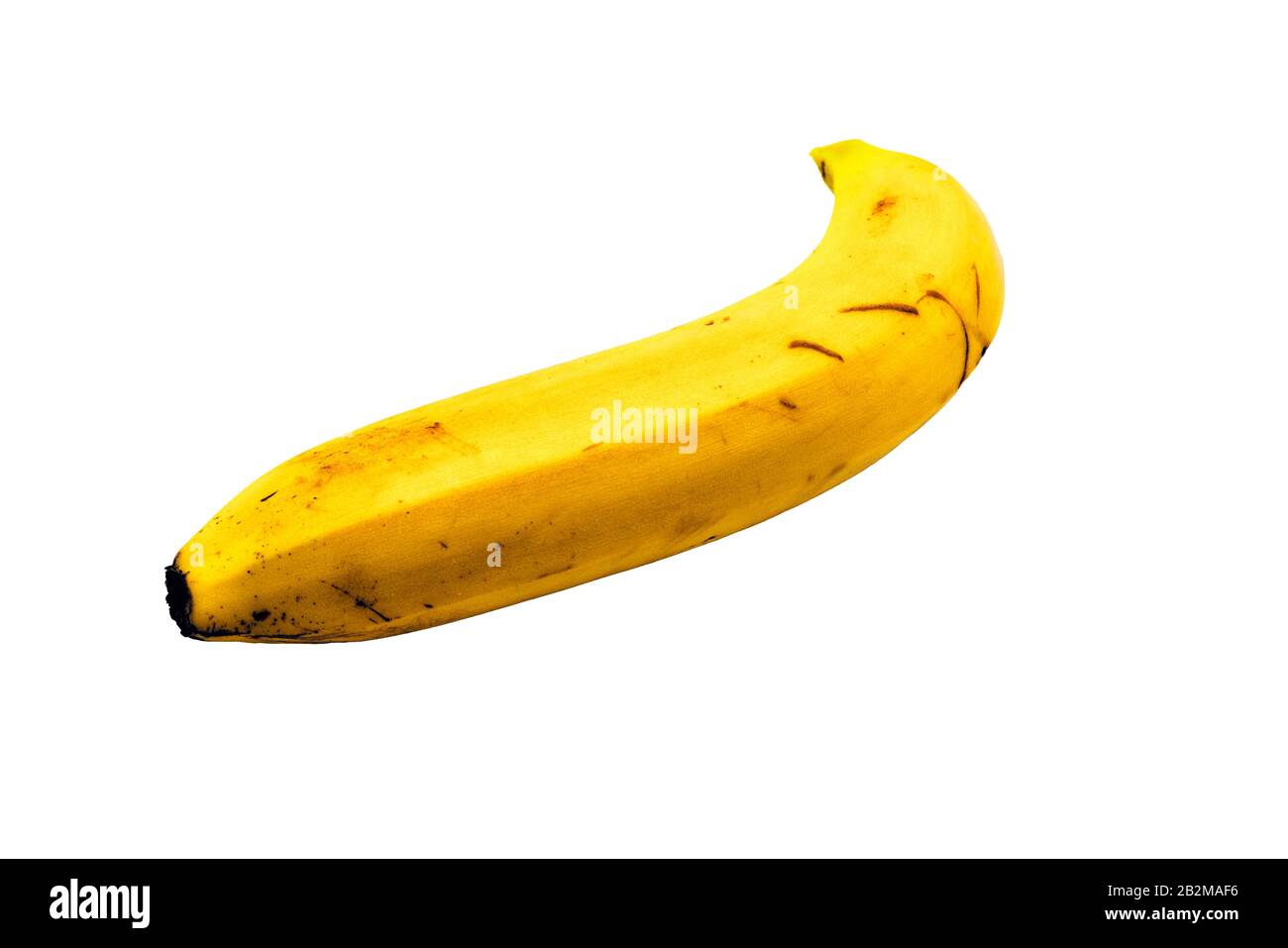 One ripe yellow banana on a white background. Close up Stock Photo - Alamy